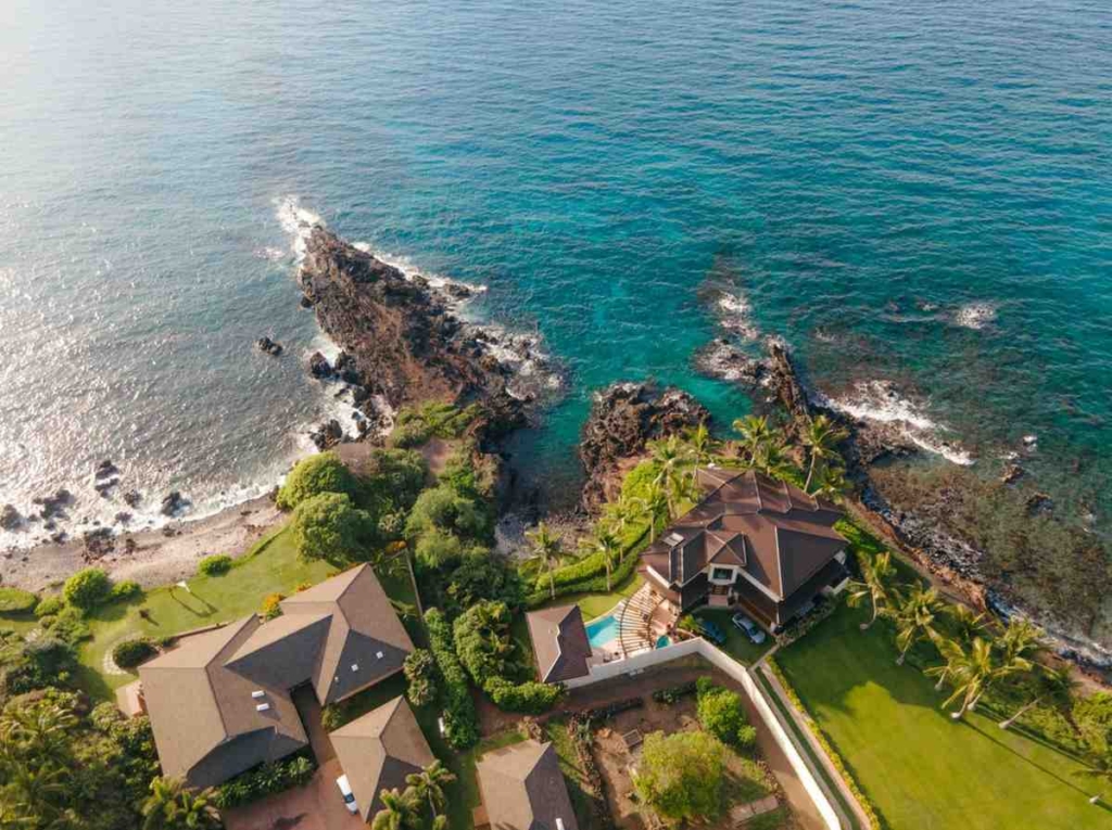 aerial view of a luxury coastal villa, ideal for buying property in bali for foreigners.