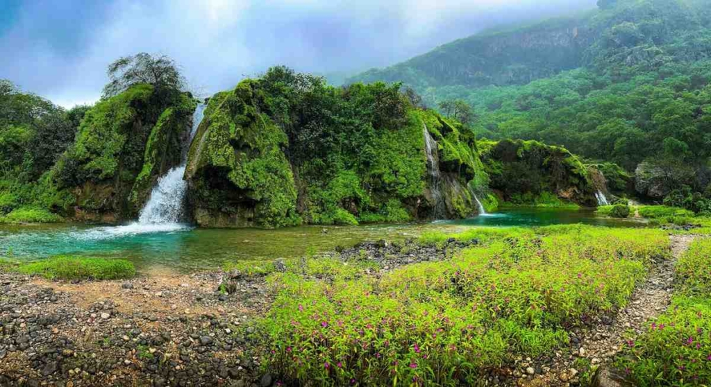 waterfalls in salalah, one of the popular cities in oman for property buyers
