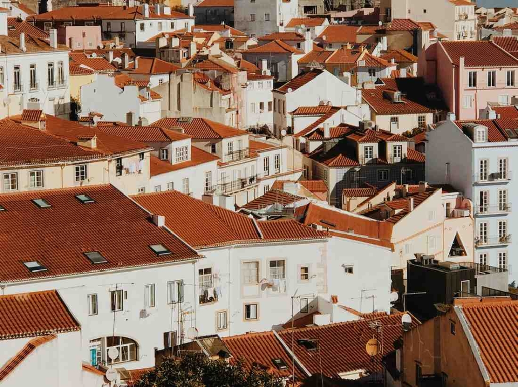 white and brown concrete houses in portugal