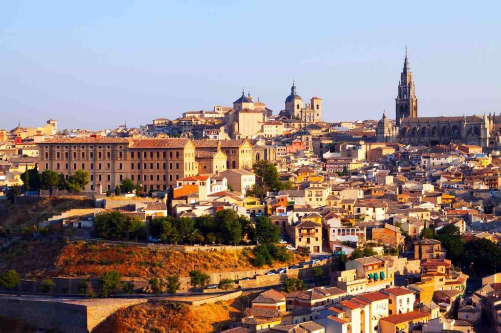 city skyline with historic architecture offering options for cheap real estate in spain
