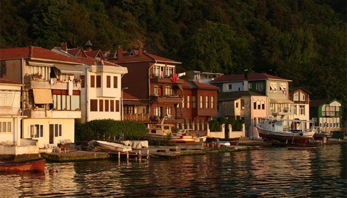 cityscape with homes and coastline illustrating living in cyprus