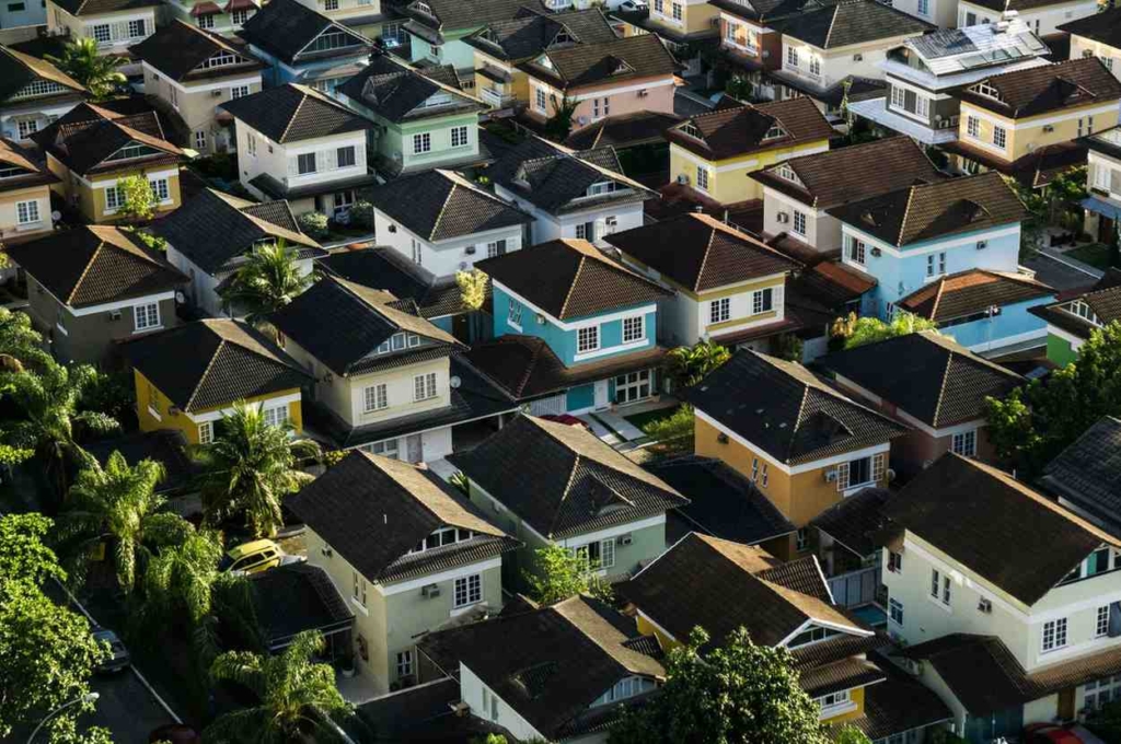 colorful residential homes showing examples of cheap houses worldwide