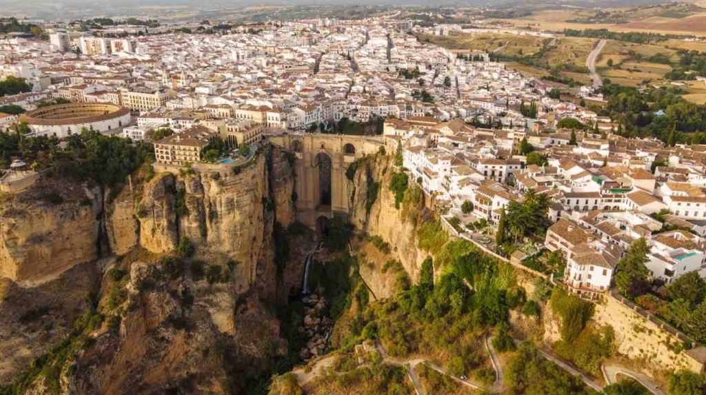 historic cliffside city with scenic views, ideal for cheap real estate in spain