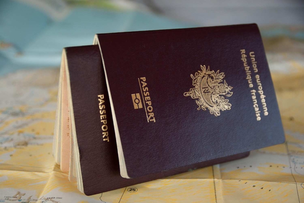 european passport on a map symbolizing relocation and spain apartments for sale opportunities