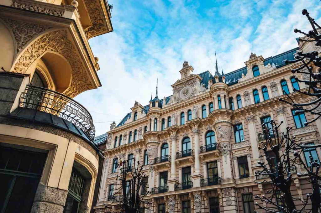european houses for sale featuring ornate historic architecture in a charming city setting.